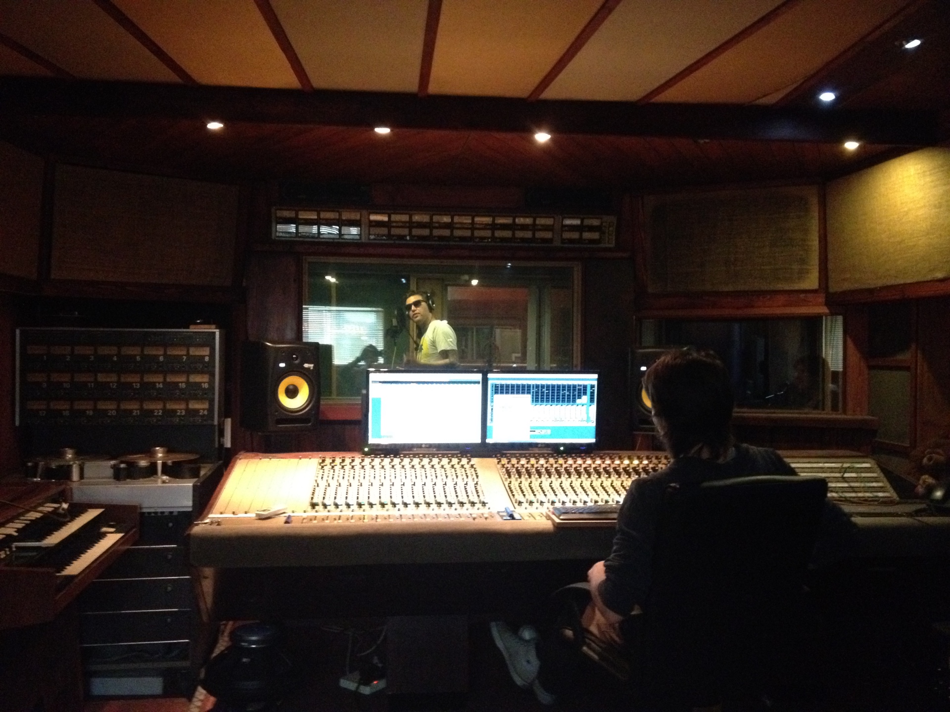 A session in progress, vocalist behind the glass